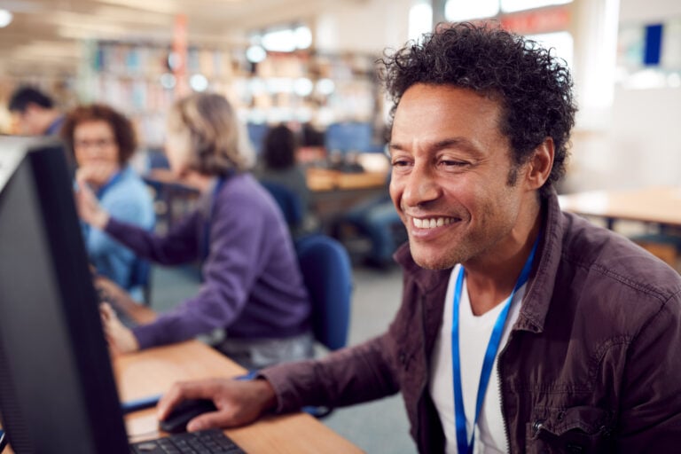 Group,Of,Mature,Adult,Students,In,Class,Working,At,Computers