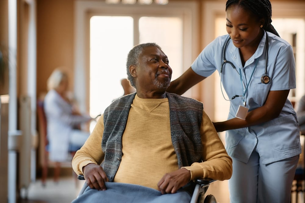 Health Care Case Management Software - image of a nurse helping a patient