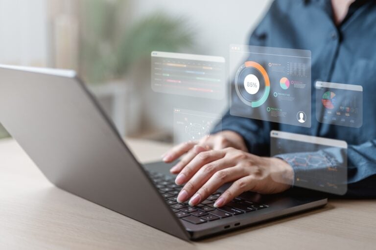 social services software solutions - image of a man working on a laptop