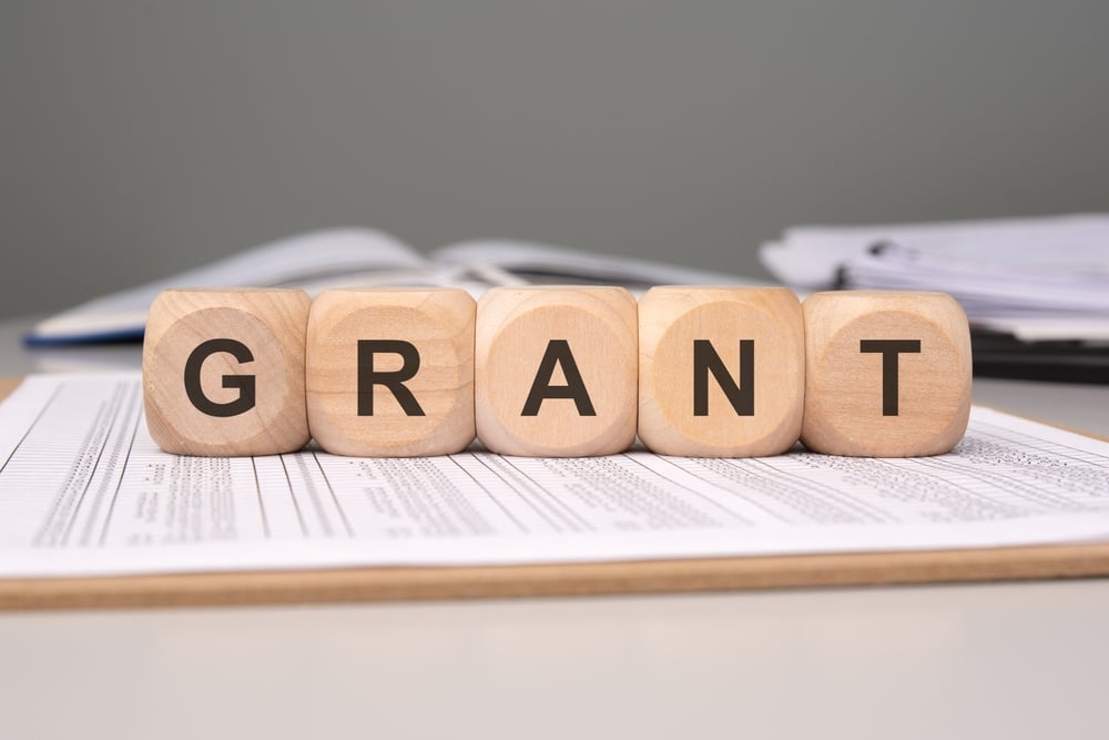 grant reporting - image of blocks spelling grant