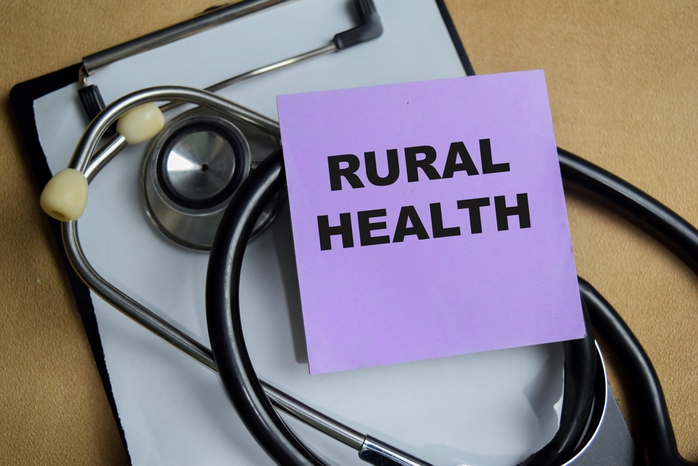 Rural Health Transformation - image of a stethoscope and a clipboard with a sticky note that reads "rural health."